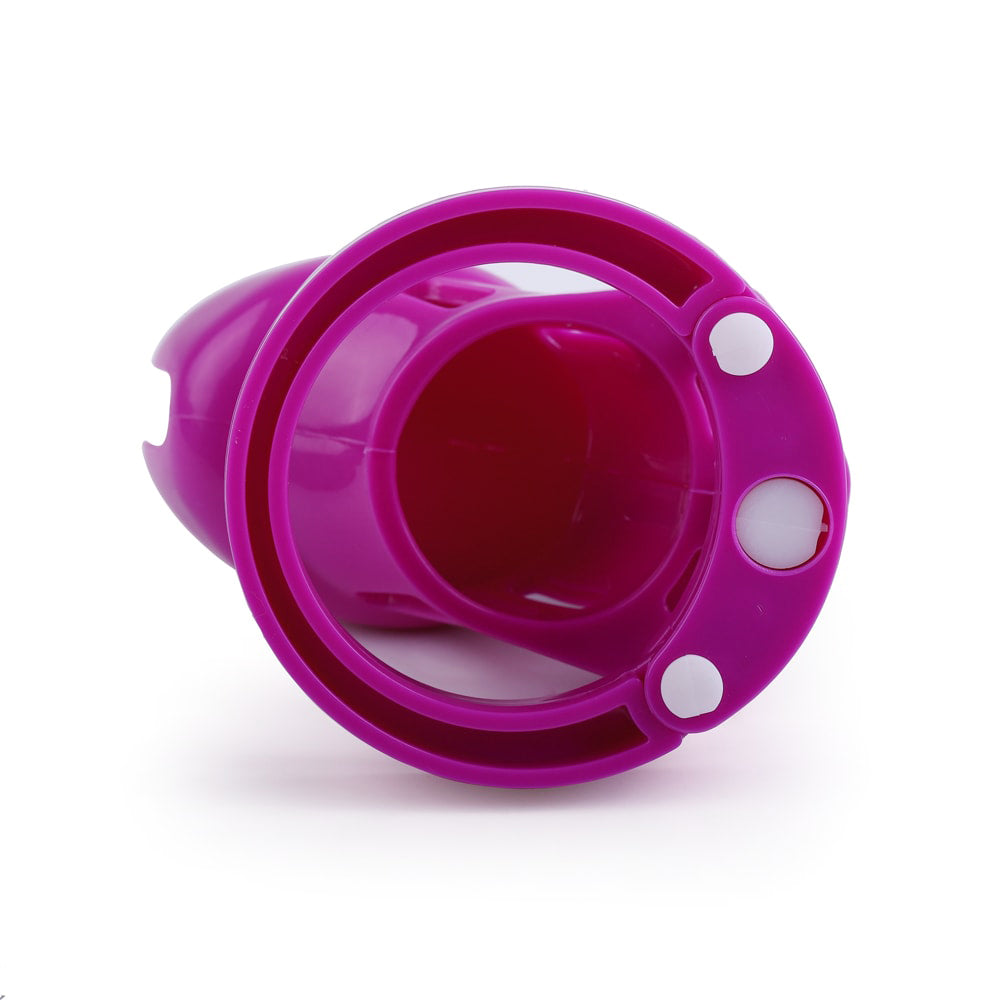 Dive into playful male chastity with this vibrant purple cage. Perfect for balancing submission at work and home, offering security through versatile locking options. Ideal for adventurous weekends!
