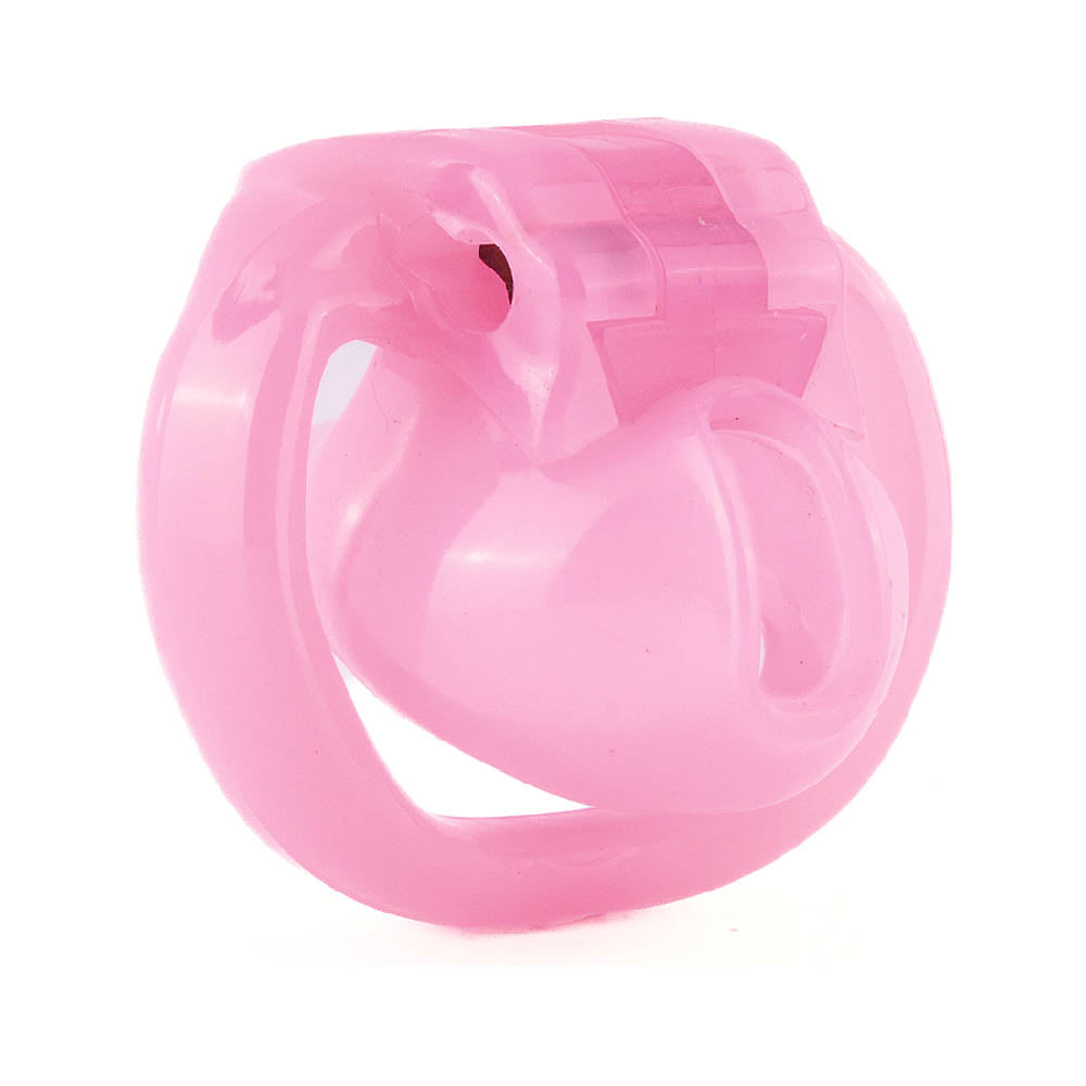 Unlock the power dynamic within yourself with our pink resin cage, a unique sissification tool. Finding a snug fit, it benefits comfort and security, making you a willing prisoner.