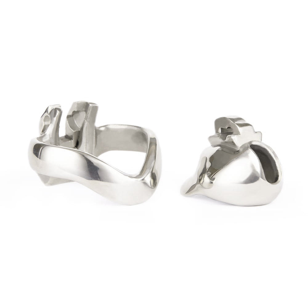 Unlock the allure of control with this sleek device. Its thick, stainless steel and wide design secure your turtle while the divider and nub add tantalizing sensations.