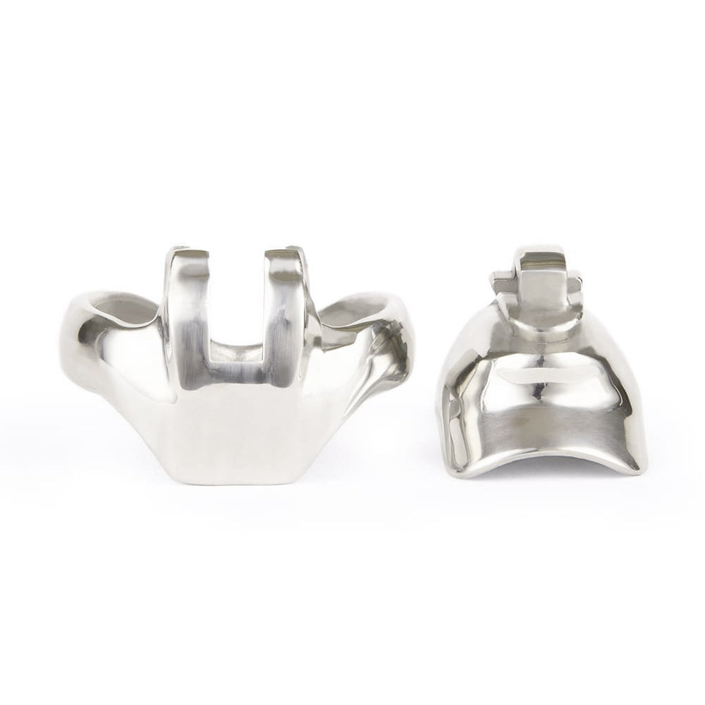 Discover the freedom of submission with the Holy Trainer V4, a short silver metal cage. Its comfortable design, normal fit, and secure lock enhance chastity play, ensuring healthy control without the harmful side effects of heavier cages. Ships with various ring sizes for personalized comfort.
