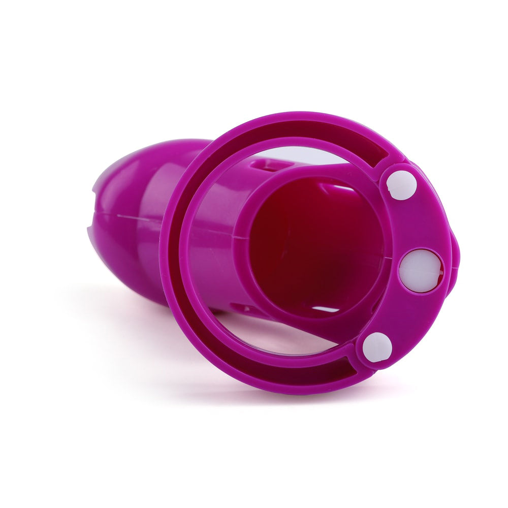 Secure your fantasies with this purple plastic chastity device, designed for comfortable, long-term wear under clothing. Affordable, discreet, and perfect for beginners or seasoned enthusiasts.