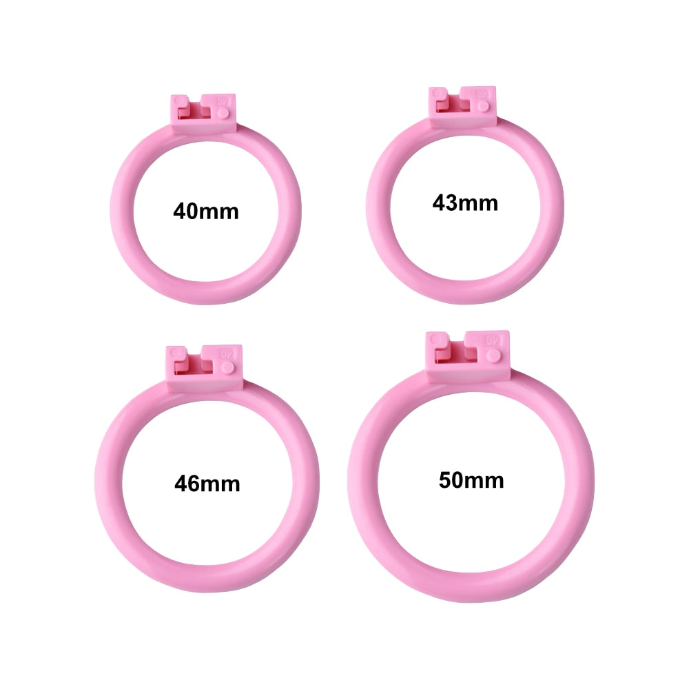 Secure your submission with this pink silicone chastity cage, designed for smaller dimensions. Enjoy comfort with little effort thanks to its snug fit and customizable rings.