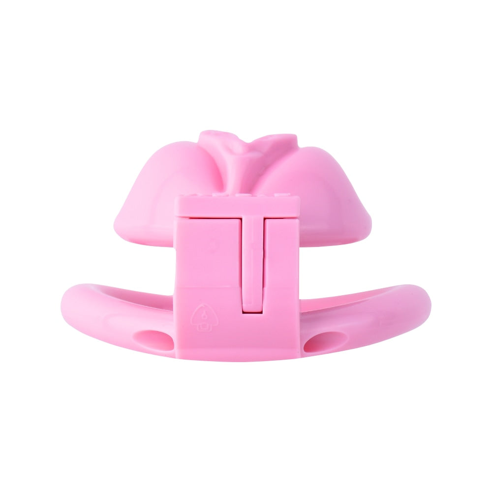 Unlock your feminine side with this snug pink sissy cage. Made from skin-friendly silicone, it prevents slipping, avoids pinch, and holds securely with versatile rings for all-day comfort.