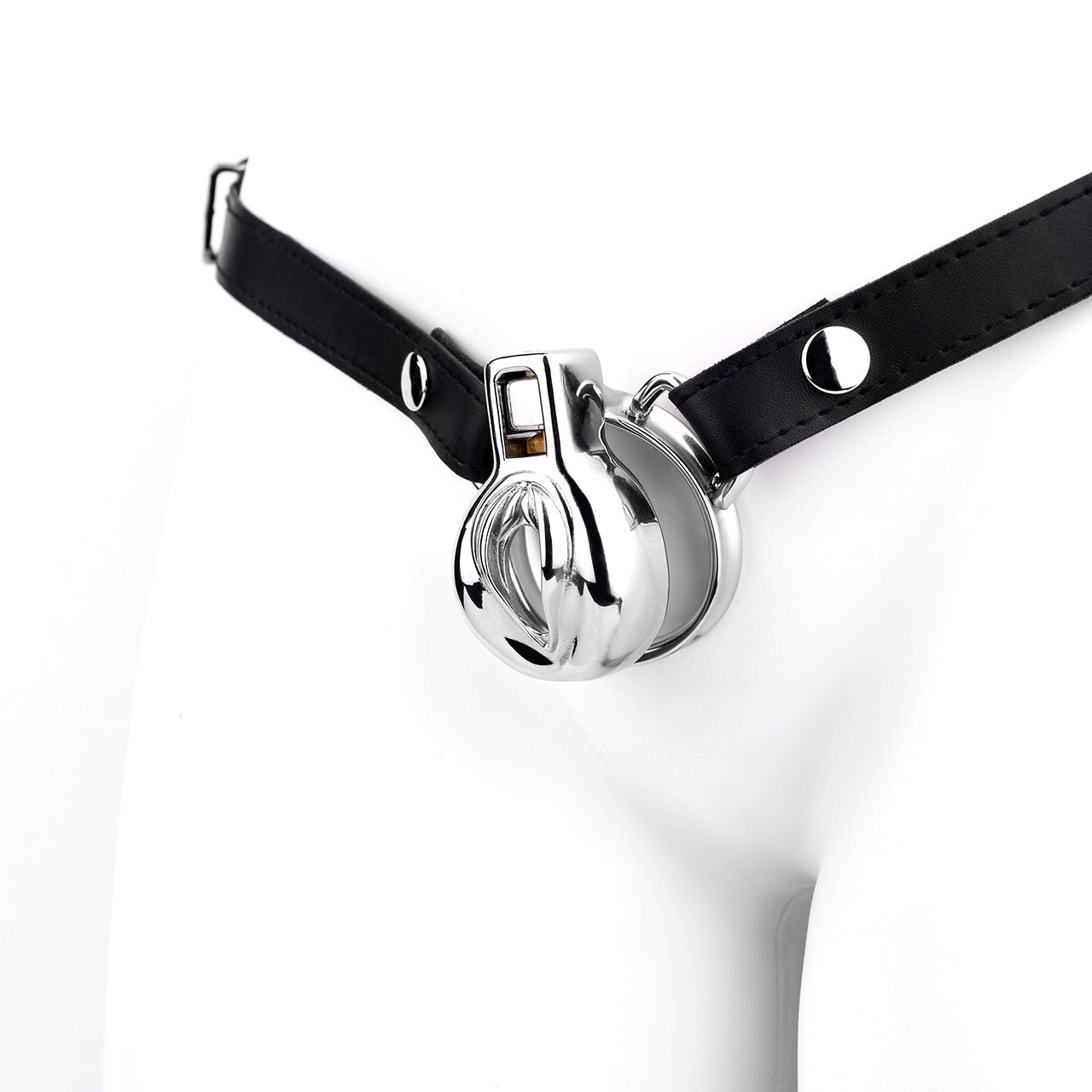 Indulge your masculine side while serving your dom. This strong, sleek silver clitty cage offers a snug fit and beta comfort. Ships with extras, making it a stylish choice. Get locked up!