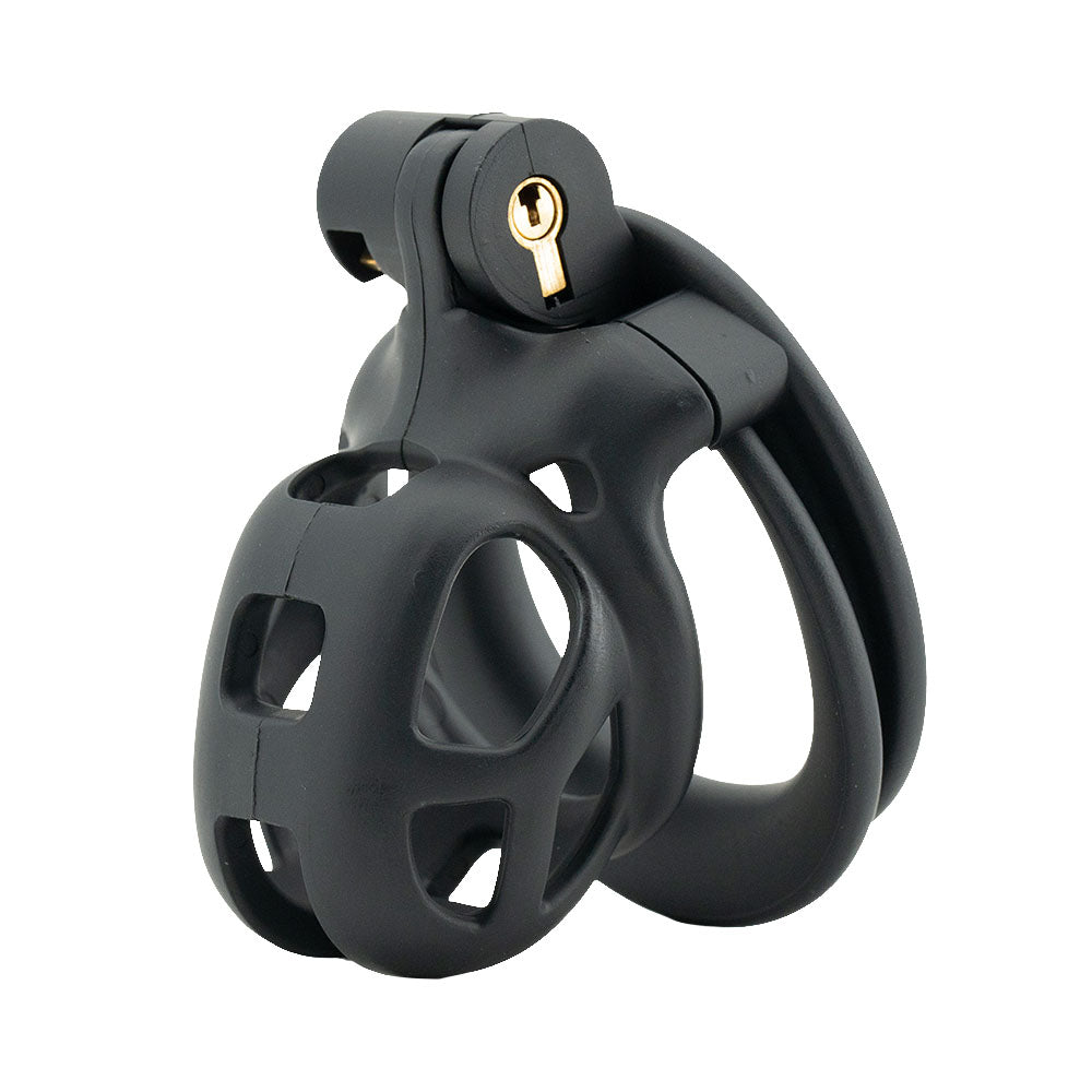 Discover sleek chastity with our lightweight, breathable black cage. Available in a range of sizes including Nano, it ensures comfort and security while offering easy maintenance and a discreet design for all wearers.